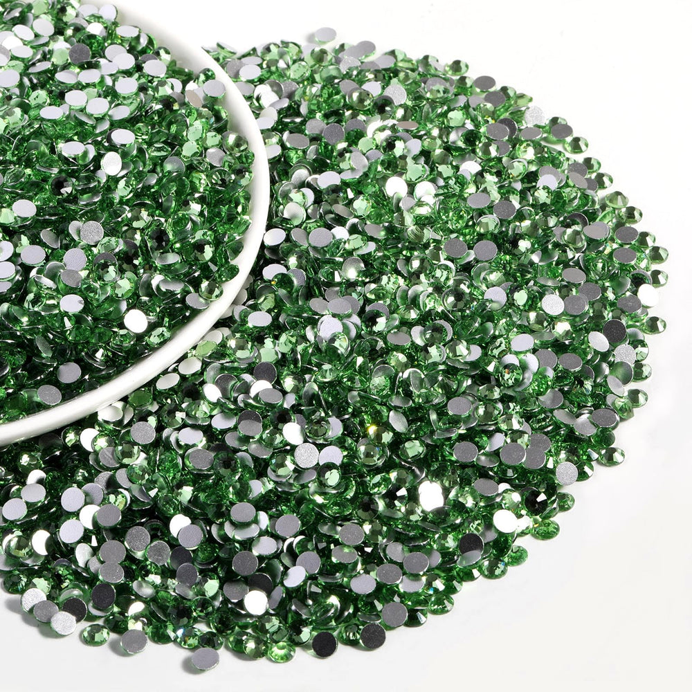 Beadsland flatback stones decorate bags and accessories with durable gloss.