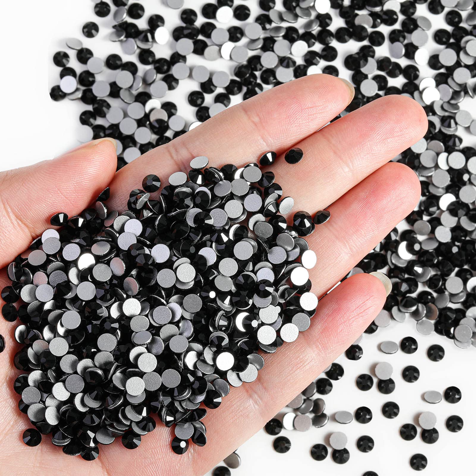 BEADSLAND nail art rhinestones flatback black adds durable shine to designs.