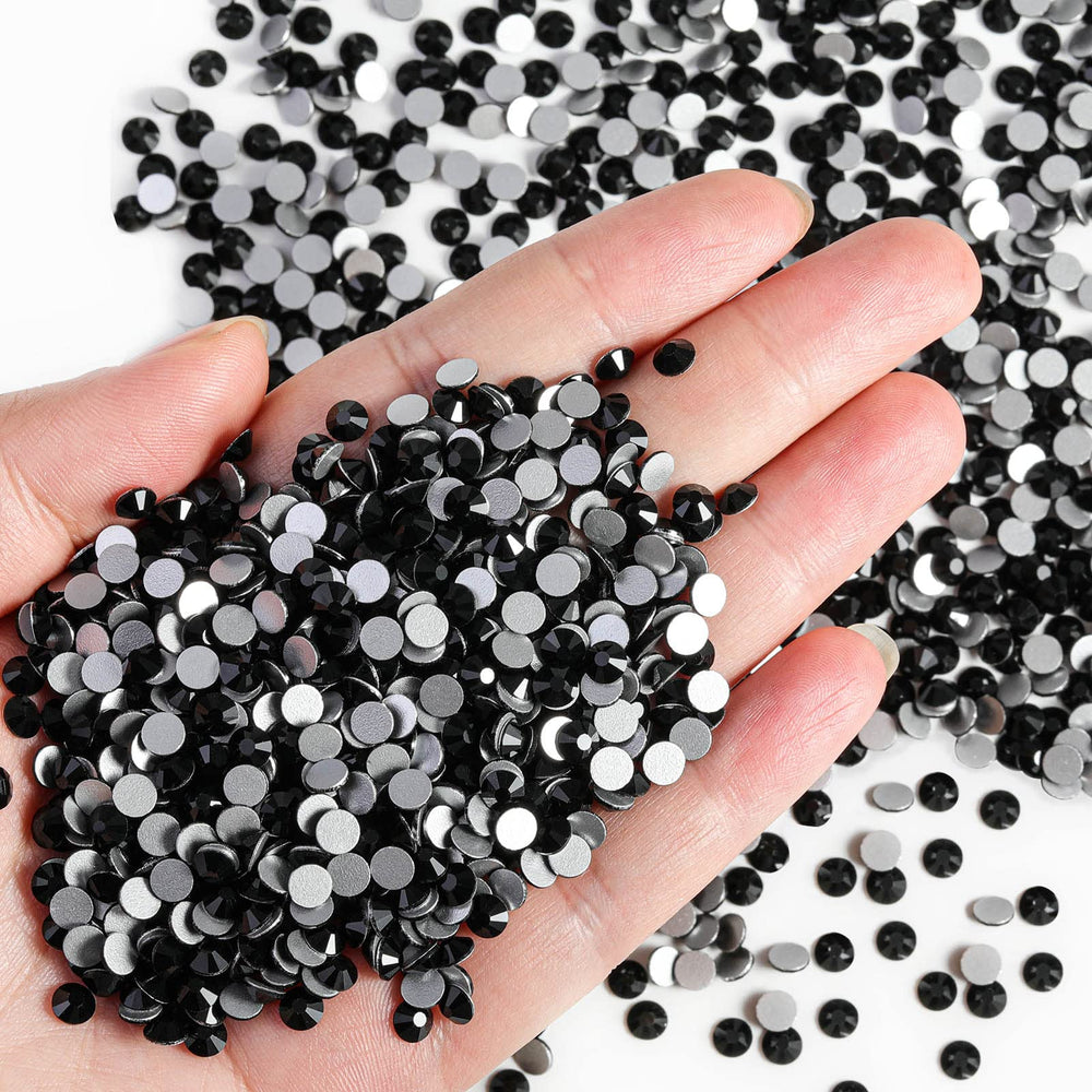 BEADSLAND nail art rhinestones flatback black adds durable shine to designs.