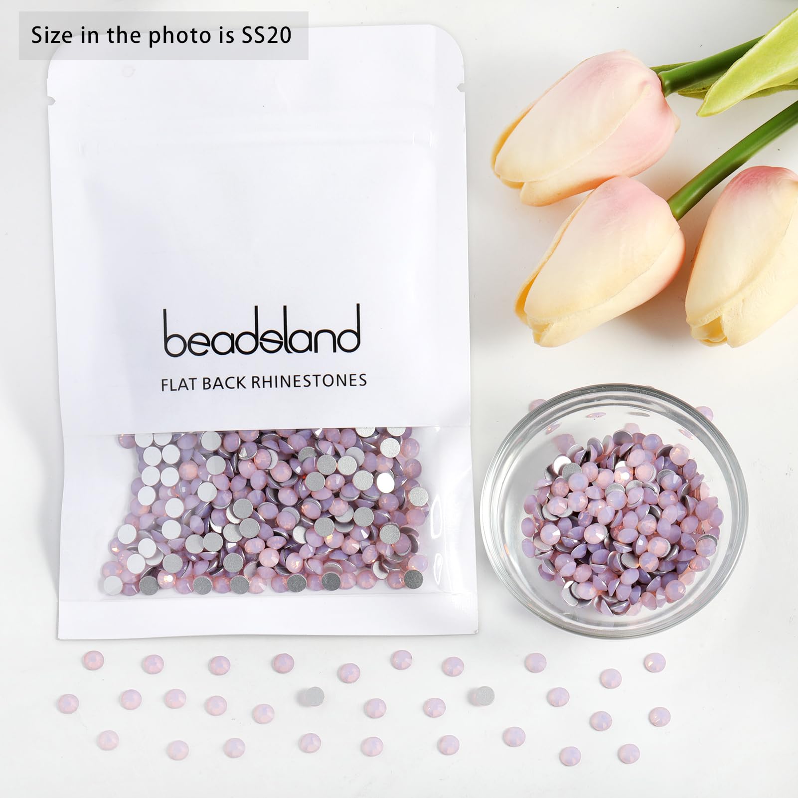 Beadsland rhinestones on nails, bags, and phones for versatile decor.