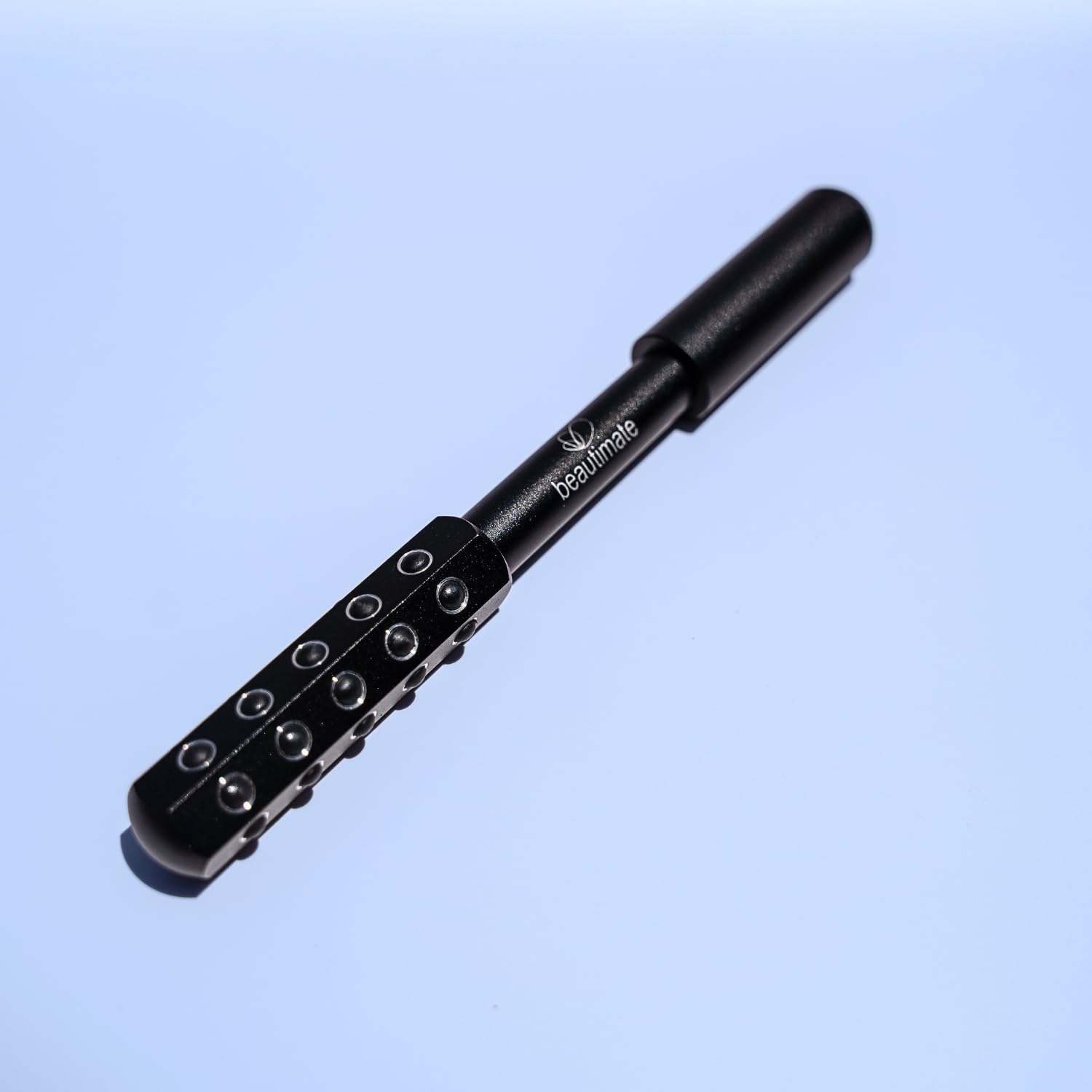 Beautimate Germanium Roller along jawline for contouring and definition.
