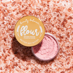 Beauty Bakerie Flour Setting Powder powder-dispense close-up demonstrates easy, breathable application