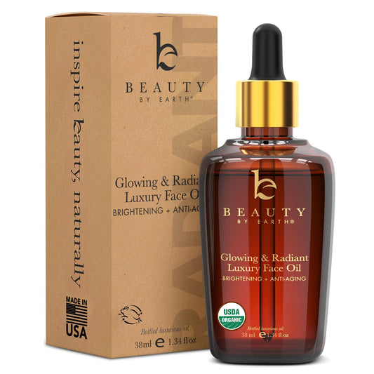 Beauty by Earth face oil bottle with organic formula for deep hydration.