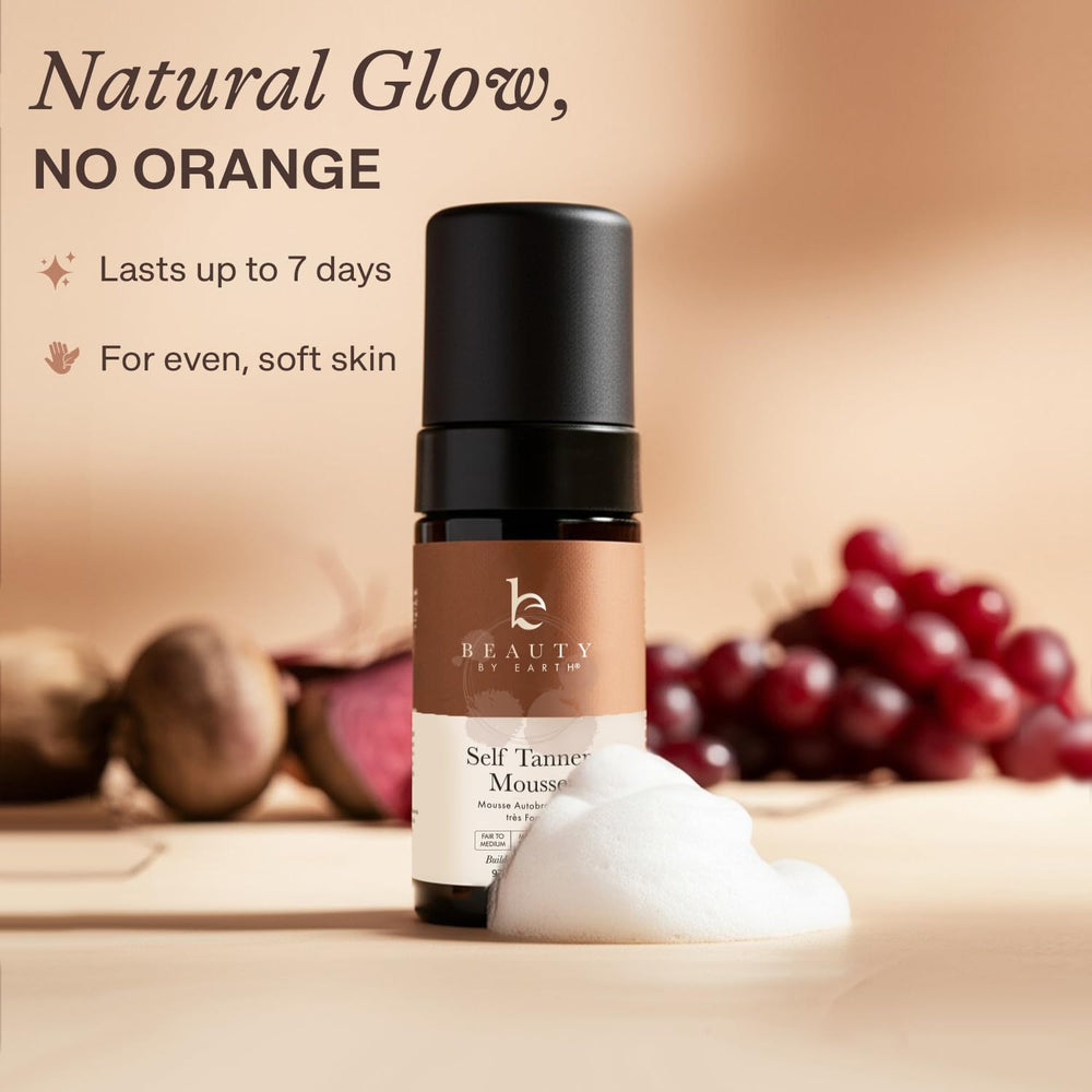 Applicator mitt with Beauty by Earth Self Tanner Mousse ready for smooth results
