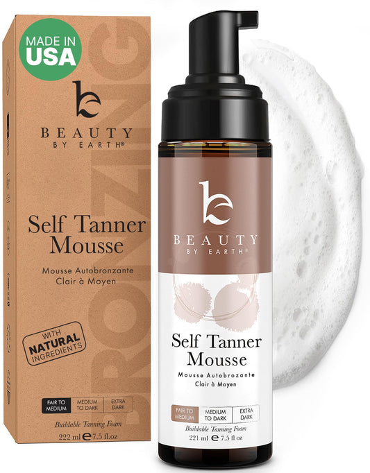 Beauty by Earth self-tanner mousse bottle showing natural, streak-free tan