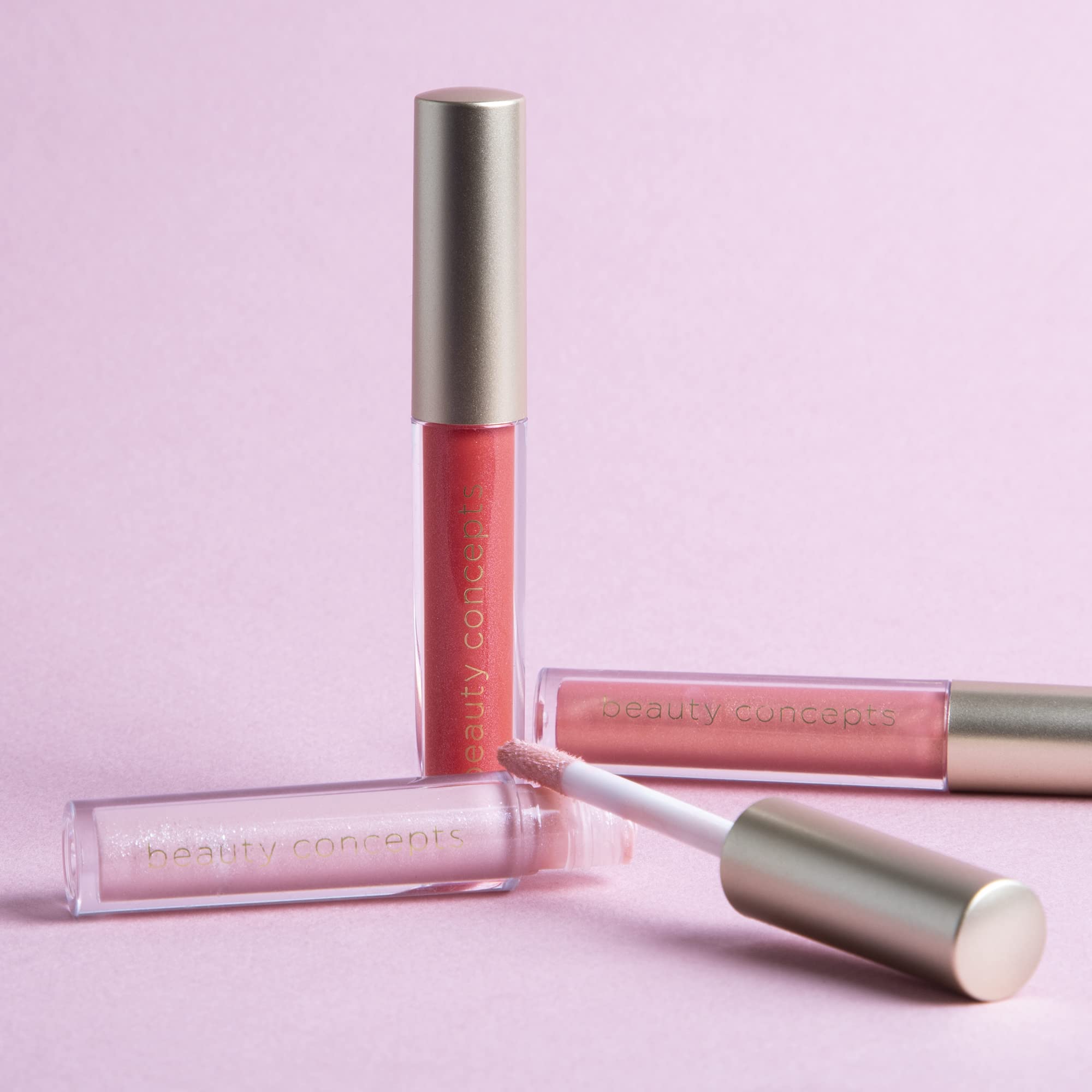 Beauty Concepts Lip Gloss Pink Shades for a radiant daytime look.