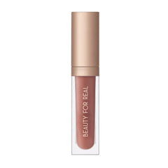 Beauty For Real Nudist lip gloss cap with mirror and LED wand for precise reapplication.