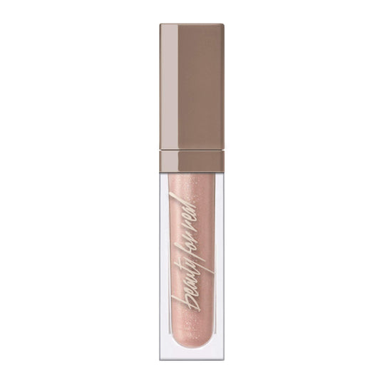 Beauty For Real Starlust lip gloss bottle front shows champagne pink metallic shine
