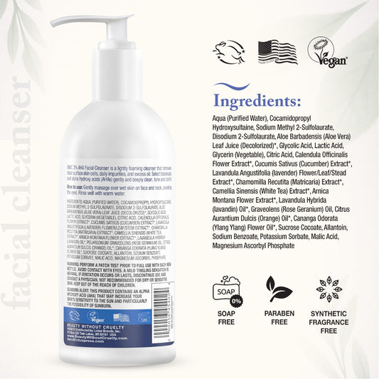 Beauty Without Cruelty AHA Facial Cleanser bottle surrounded by botanicals, gentle cleansing for normal to oily skin