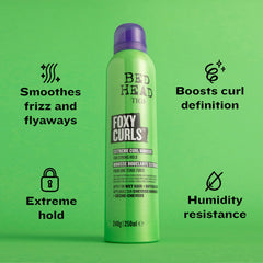 Bed Head Foxy Curls Mousse delivers strong hold for defined curls.