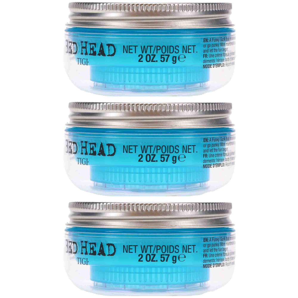 Hands applying Bed Head Manipulator for controlled styling