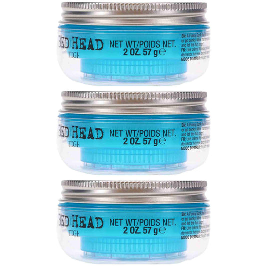 Hands applying Bed Head Manipulator for controlled styling