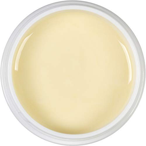 BeeFriendly Organic Face Cream jar lid close-up highlighting natural ingredients for balanced skin.