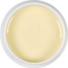 BeeFriendly Organic Face Cream jar lid close-up highlighting natural ingredients for balanced skin.