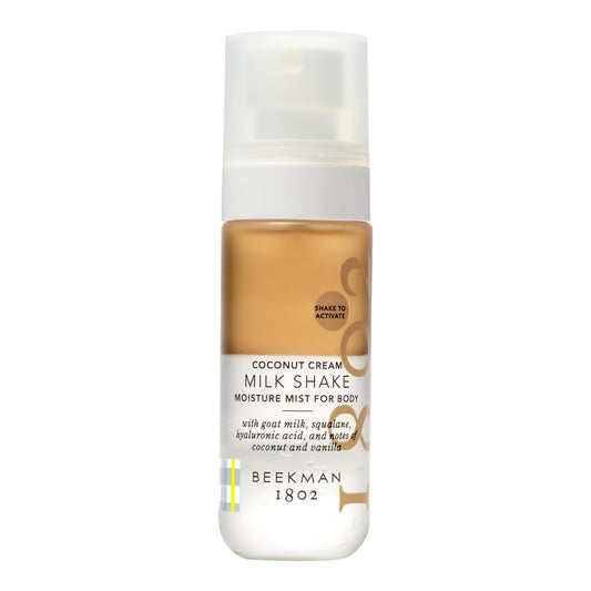 Beekman 1802 Milk Shake Body Mist Coconut Cream bottle showcases lightweight hydration for sensitive skin.