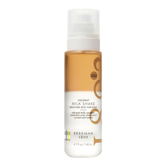 Beekman 1802 Milk Shake Body Mist Coconut Cream bottle for instant hydration.
