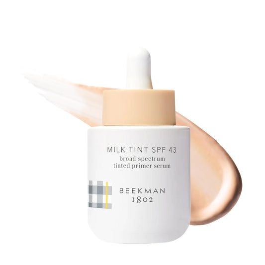 Beekman 1802 Milk Tint Primer SPF 43 bottle offers lightweight mineral protection for daily makeup.