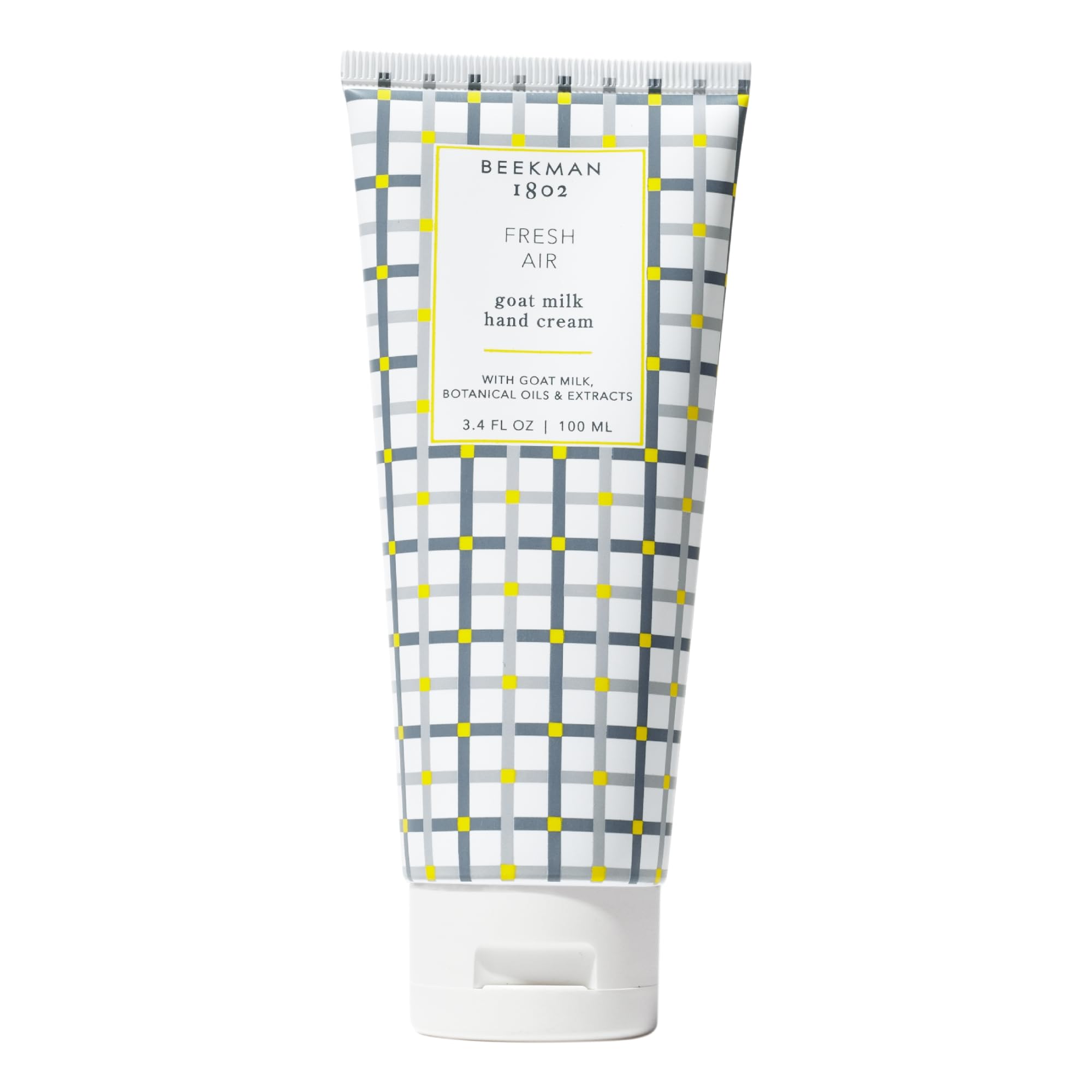 Beekman 1802 Pure Goat Milk Hand Cream Fresh Air bottle shows portable hydration for skin.