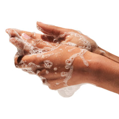Beekman 1802 Goat Milk Hand Wash Lavender label closeup emphasizes natural ingredients and soothing scent.