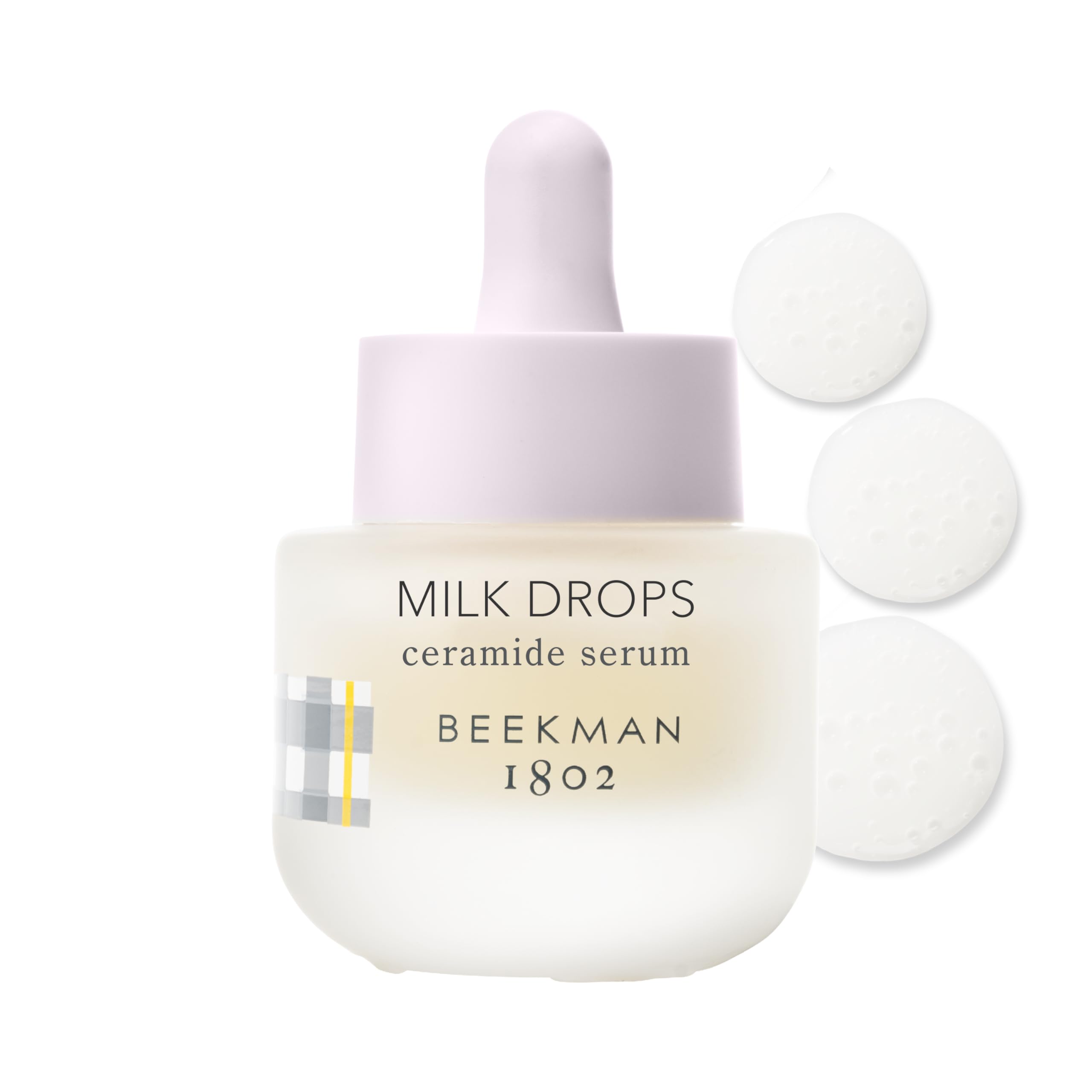 Beekman 1802 Milk Drops Serum bottle front shows fragrance-free hydration for oily skin.