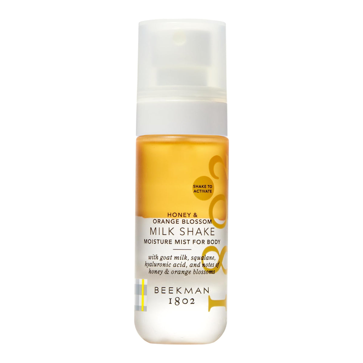 Beekman 1802 Milk Shake Body Mist bottle with honey and orange blossom fragrance for hydration.