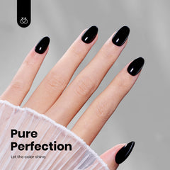 Beetles Black Gel Polish swatch on nail for full-coverage look.