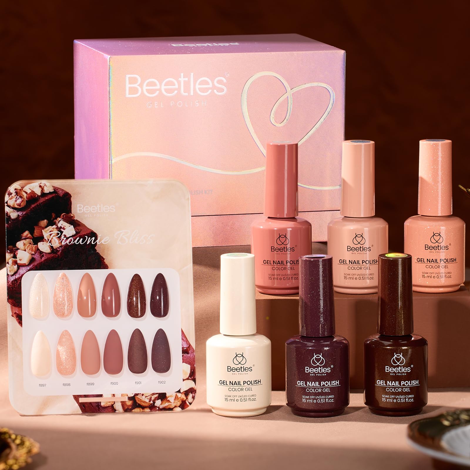 Warm chocolate brown shades on manicure swatches by Beetles Gel Polish.