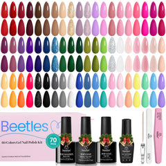 Beetles complete nail-care set includes file, buffer, cuticle stick, and guide.