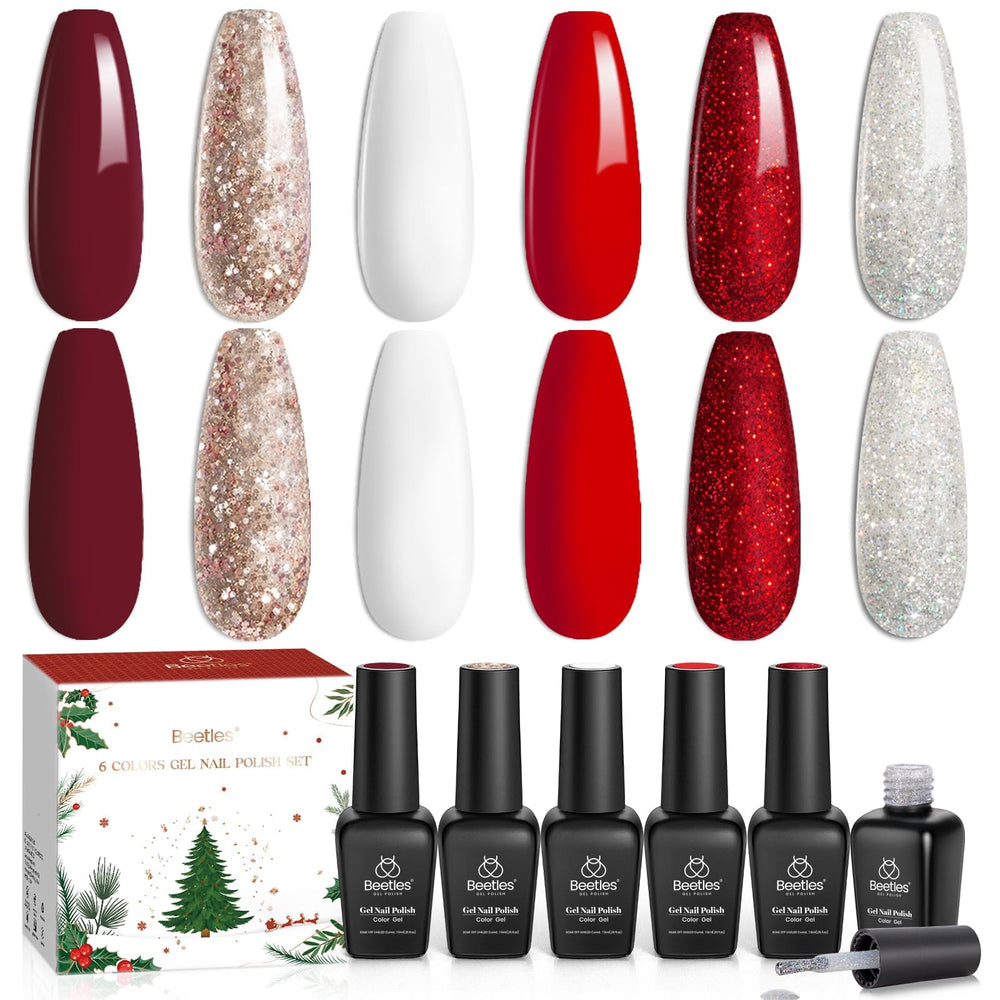 Beetles Holiday manicure on polished nails with red and white accents.