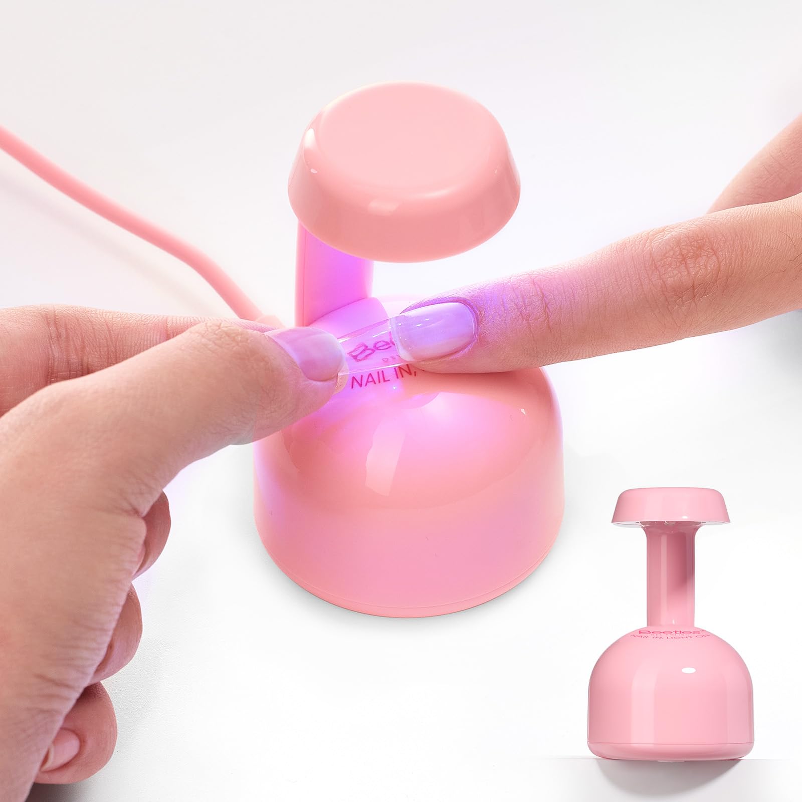 Beetles Mini UV Light pink exterior for quick at-home gel nails.