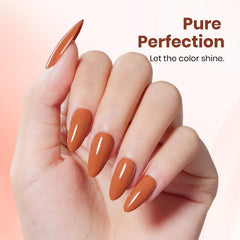 Beetles orange polish under LED lamp demonstrates quick cure for efficient sessions.
