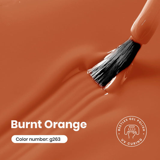 Beetles orange gel polish swatch displays vibrant coverage on a nail.