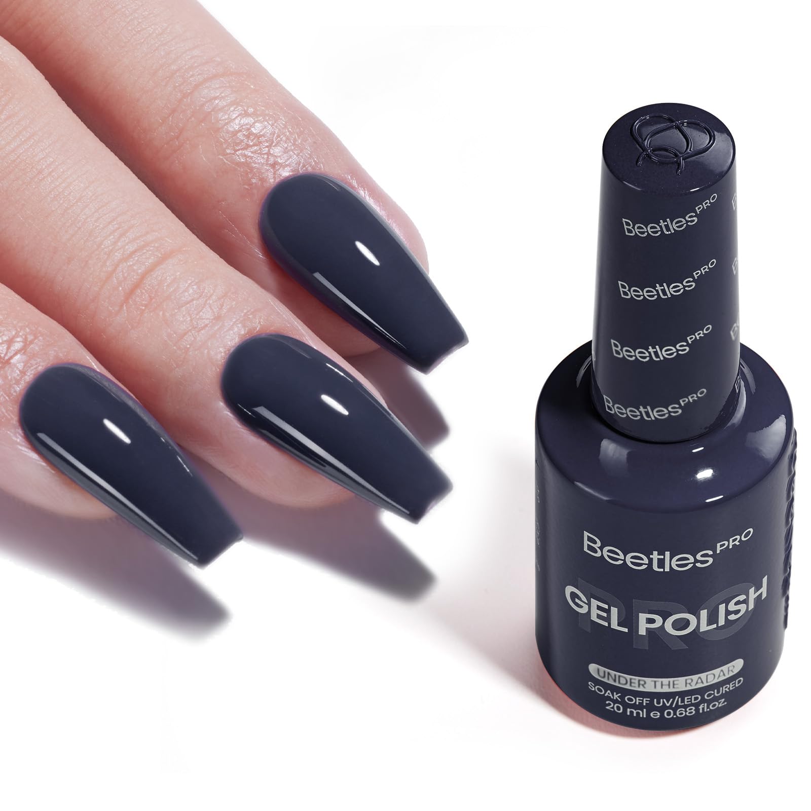 Beetles Pro Under The Radar bottle-cap swatch shows rich navy shade with even coverage.