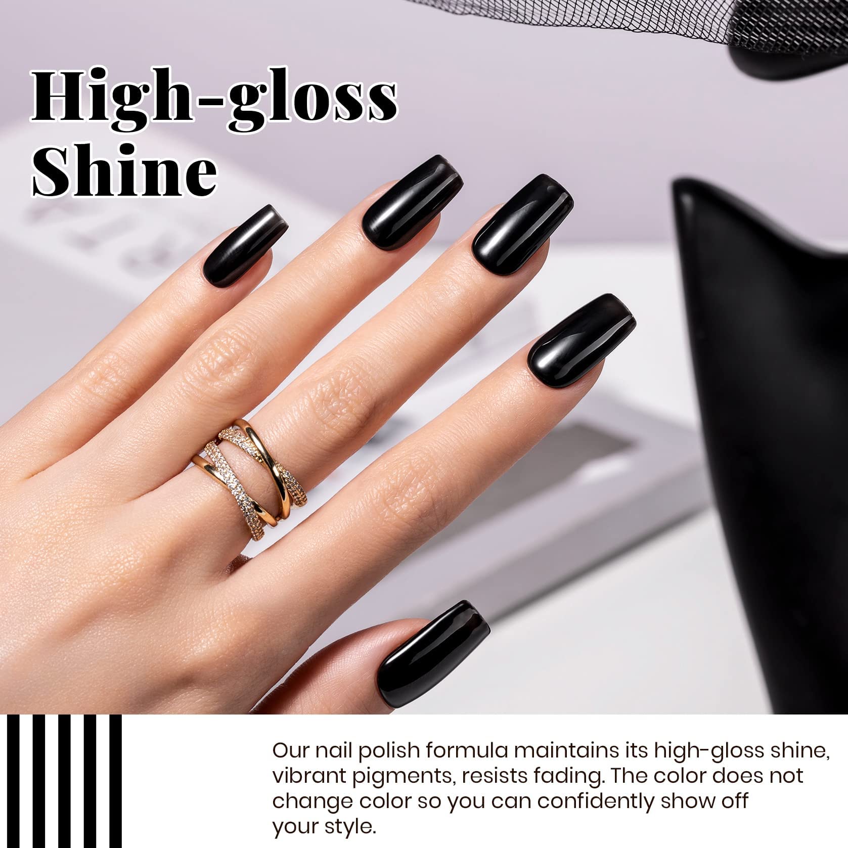 Beetles Valentine-inspired nails in black and white for chic at-home styling.