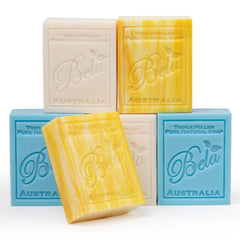 BELA Goat Milk Original soap bar on a wooden tray, ideal for gentle daily cleansing.