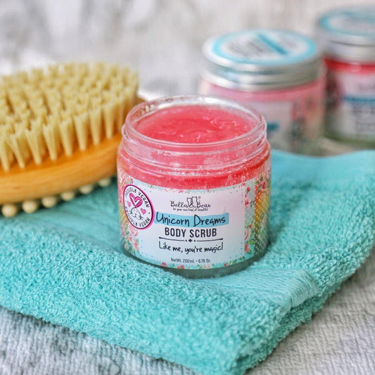 Texture close-up of Bella & Bear Unicorn Dream Body Scrub with exfoliating grains.