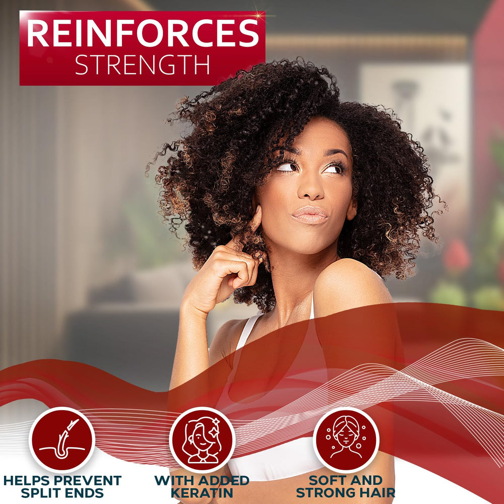 Bellisso hair application massage depicting hands working product through damp curls