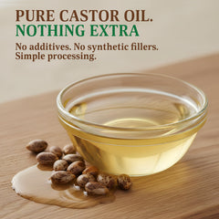 BELMAK organic castor oil close-up showing clear amber glass.