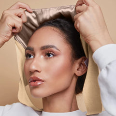 Belsen satin bonnet side view with adjustable straps stays in place.