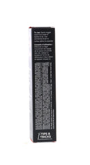 Benefit They're Real Mascara on lashes for a dramatic, lengthened look.