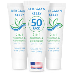 BERGMAN KELLY travel-size 2-in-1 shampoo & conditioner bottle with white tea scent for refreshed guests.
