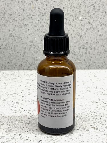 Best Nature's Cosmetics tomato seed oil dropper close-up for skin nourishment.