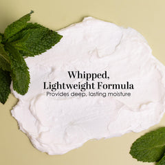 Hands applying Peppermint Body Lotion demonstrates quick, non-greasy hydration.