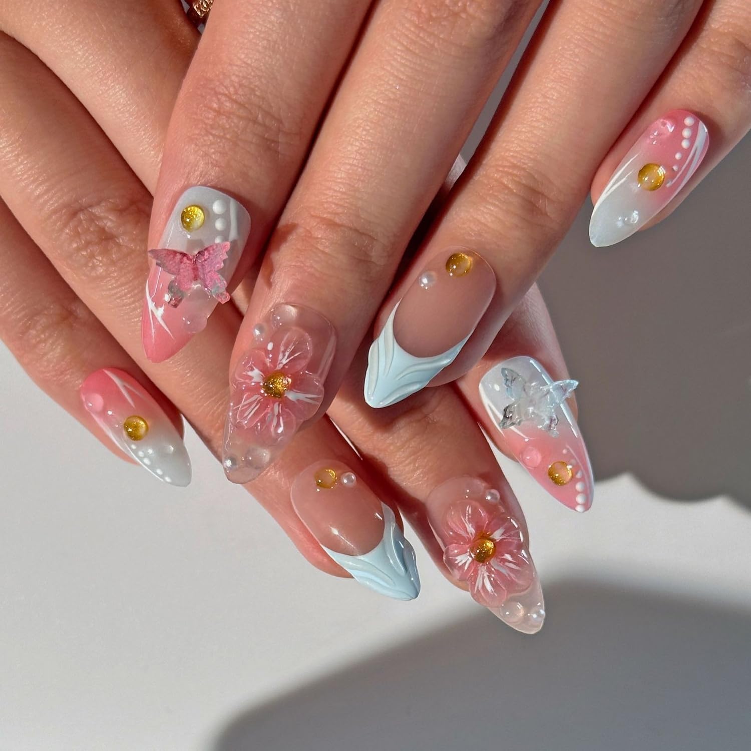 BHOOKA Medium almond shape nails in pink-blue gradient for an elegant silhouette