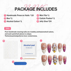 BHOOKA White flower accent nails add delicate detail to outfits.