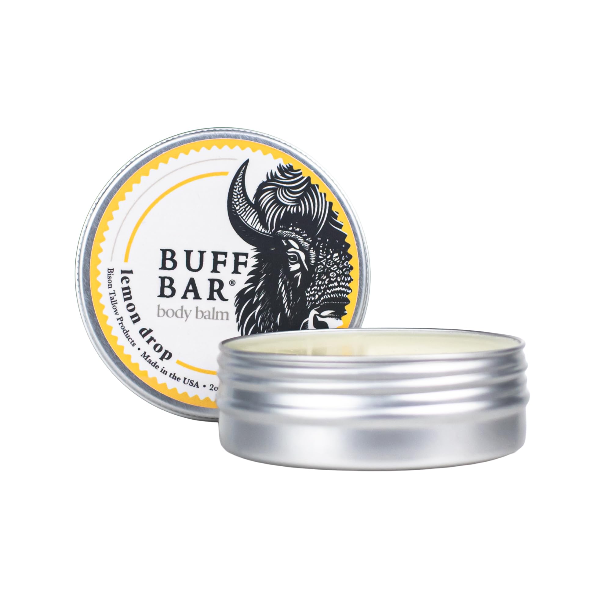 Packaging of Buff Bar Lemon Drop 2 oz tin is portable for travel skincare routines.