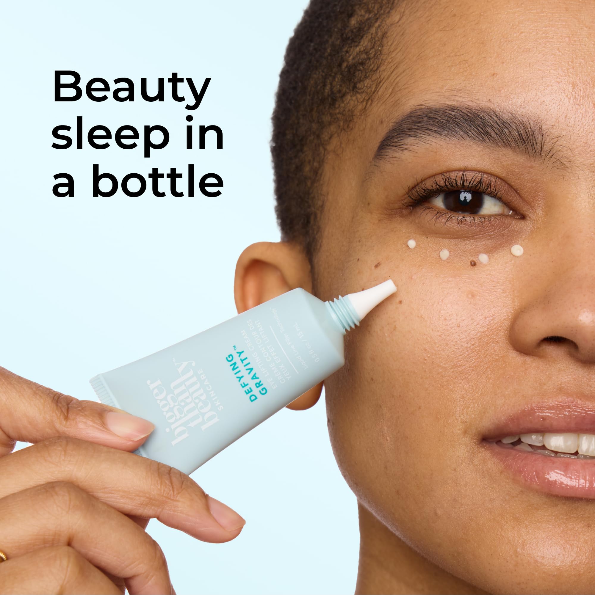 Close-up of Defying Gravity eye lifting cream texture showing a silky finish.