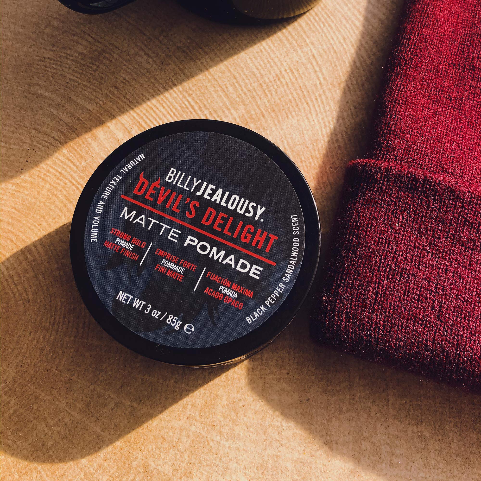 Billy Jealousy Devil's Delight matte pomade jar close-up, premium packaging.