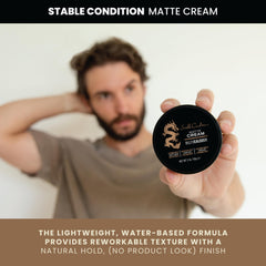 Hair being smoothed with the cream for a refined, natural look.