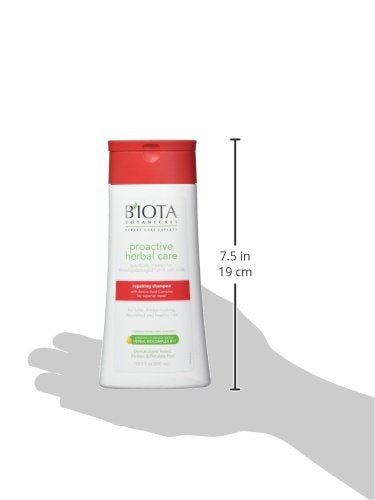 Biota Proactive Repairing Shampoo close-up on hair strands showing care.